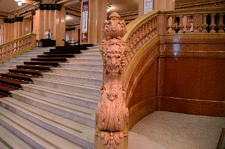 08 A Marble Dragon Adorns The End Of The Grand Staircase Teatro Colon Buenos Aires.jpg